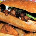 Grilled Steak Sandwich with mushrooms and provolone cheese
